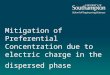 Mitigation of Preferential Concentration due to electric charge in the dispersed phase